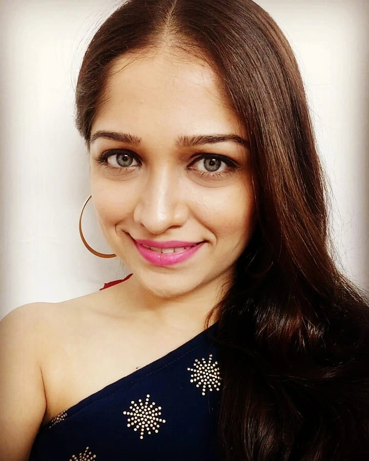 Amruta Phadke has beautiful Dark Brown eyes
